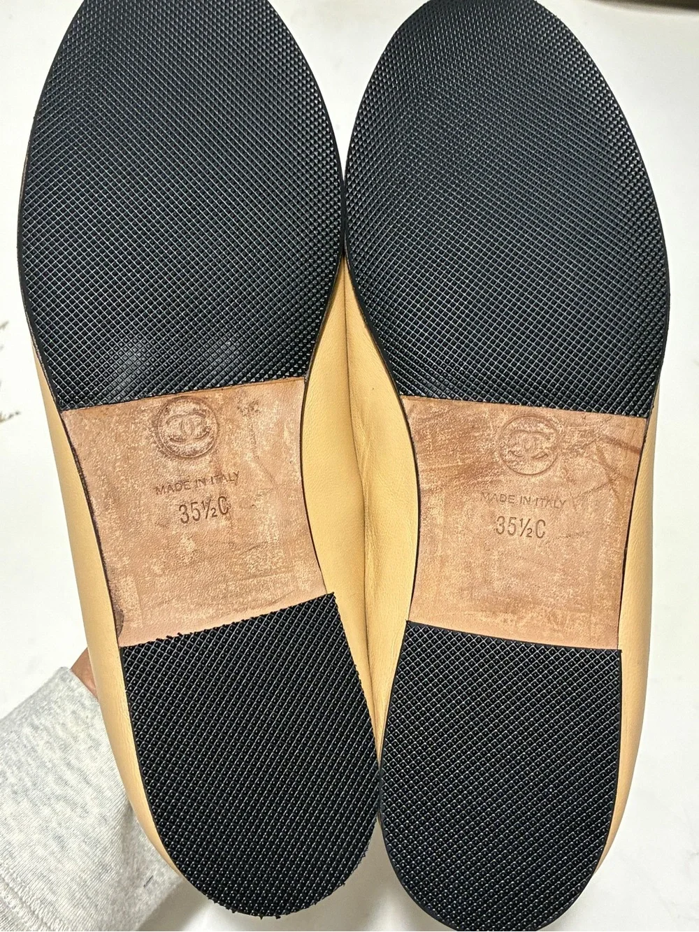 CHANEL Beige Leather Ballet Flats with Black Cap Toe and CC Logo